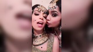 yasmina khan and other girl in cultural clothing talking